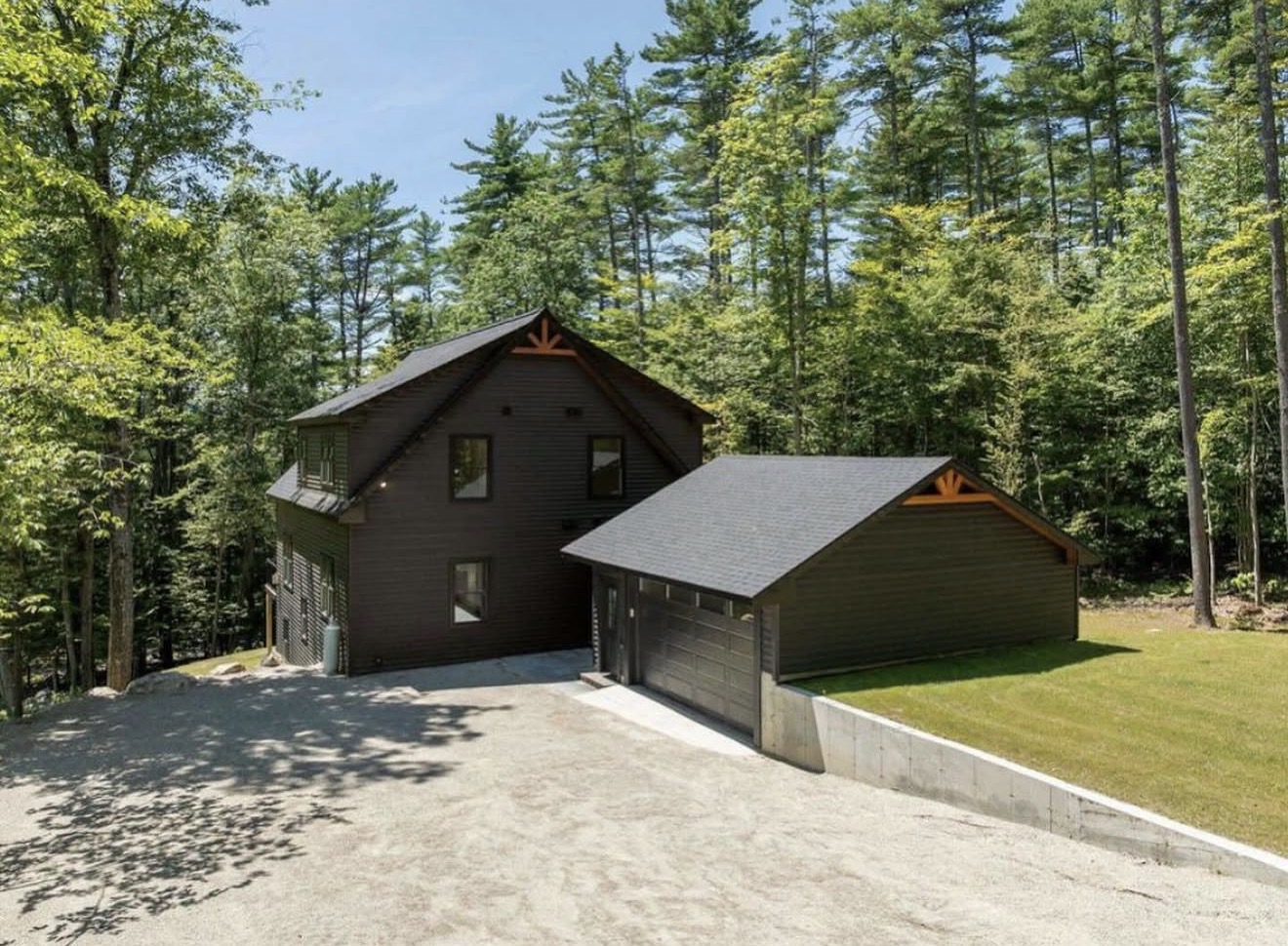 Custom home front approach with attached garage in Northern New Hampshire